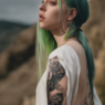 Billie Eilish’s Enigmatic Back Tattoo Sparks Social Media Frenzy